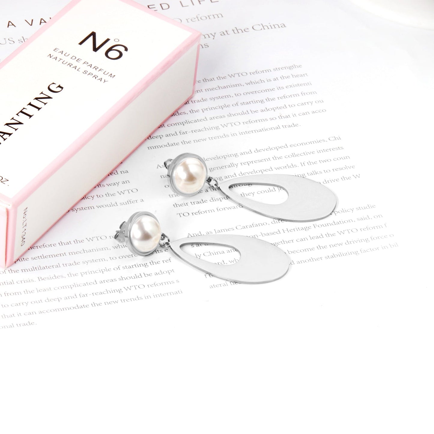 Half Pearl Glossy Oval Earrings