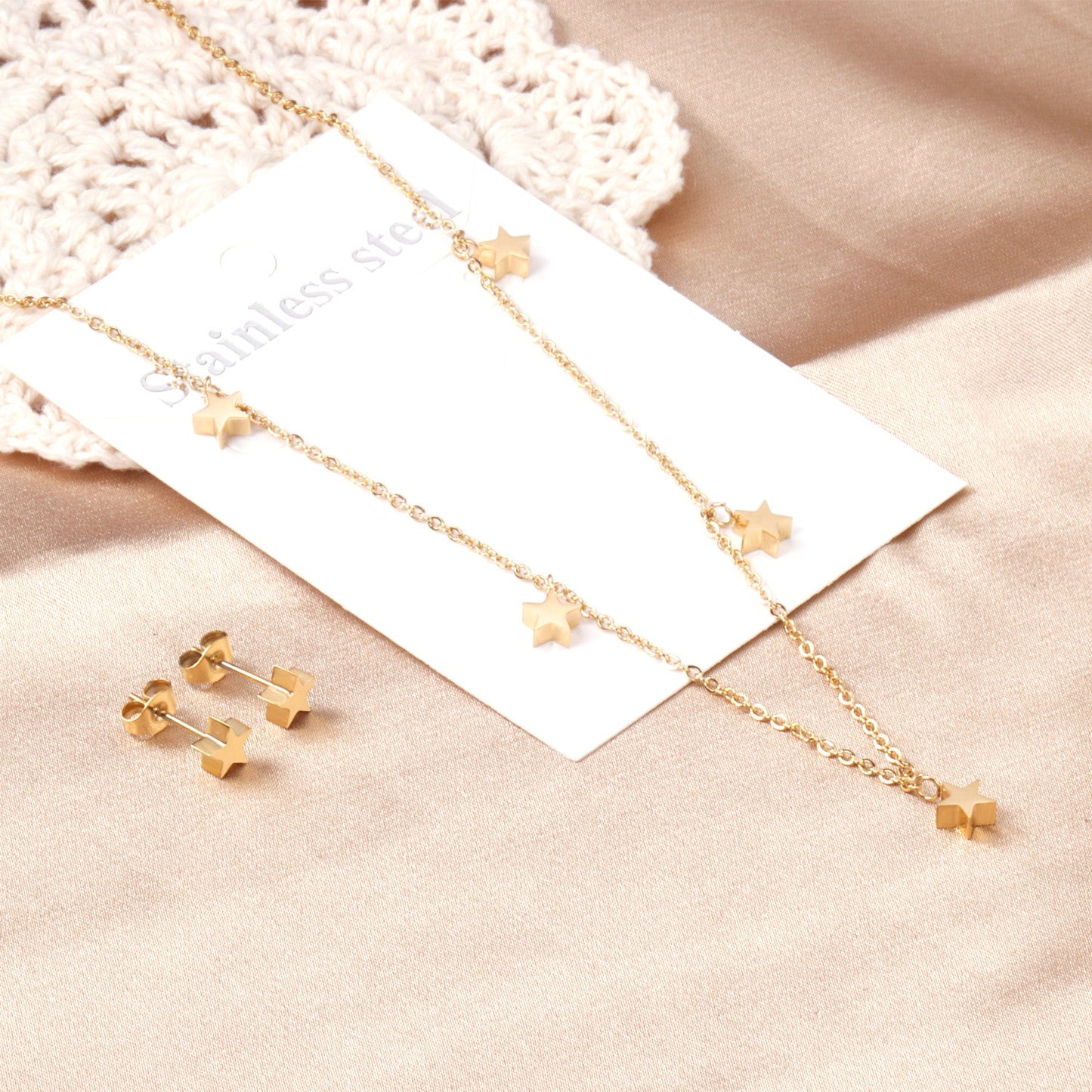 Set of 5 stars glossy steel/golden