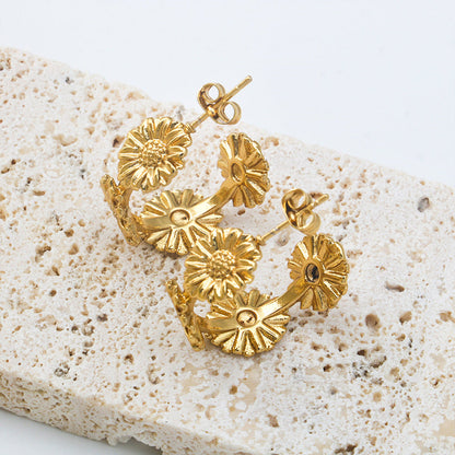 Stainless steel fresh simple personality retro C-shaped small daisy flowers female 18K gold earrings