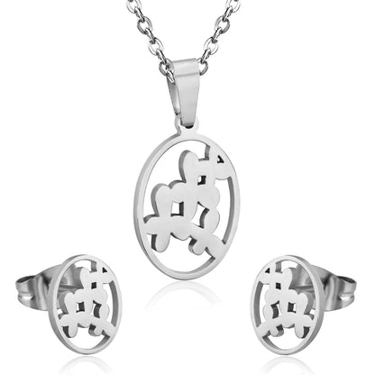 Steel/golden cut jewelry set with grass-like shape in the center without diamonds