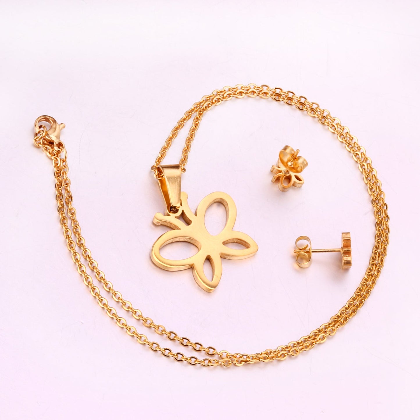 Steel/golden butterfly shape hollowed out glossy cut set without diamonds