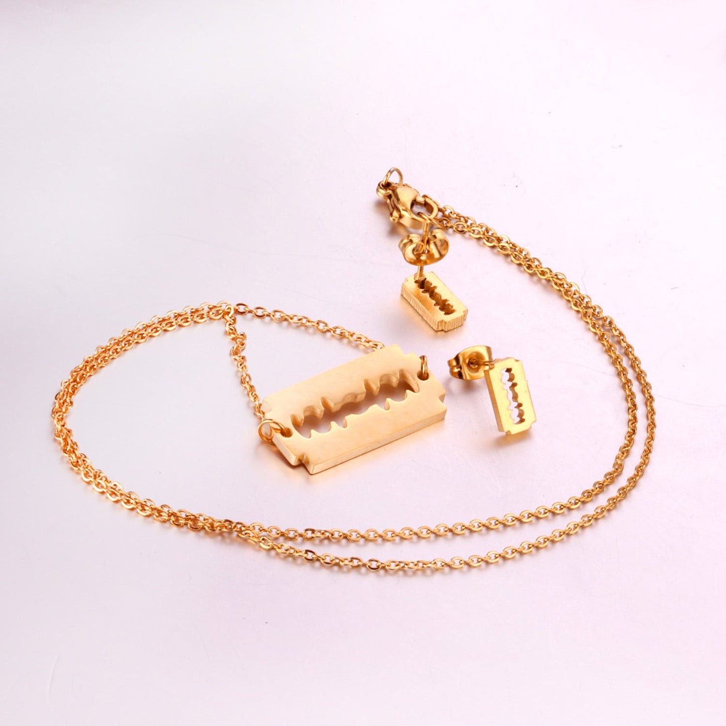 Steel/Gold Smooth Cut Center Irregular Wisps Jewelry Set without Diamonds