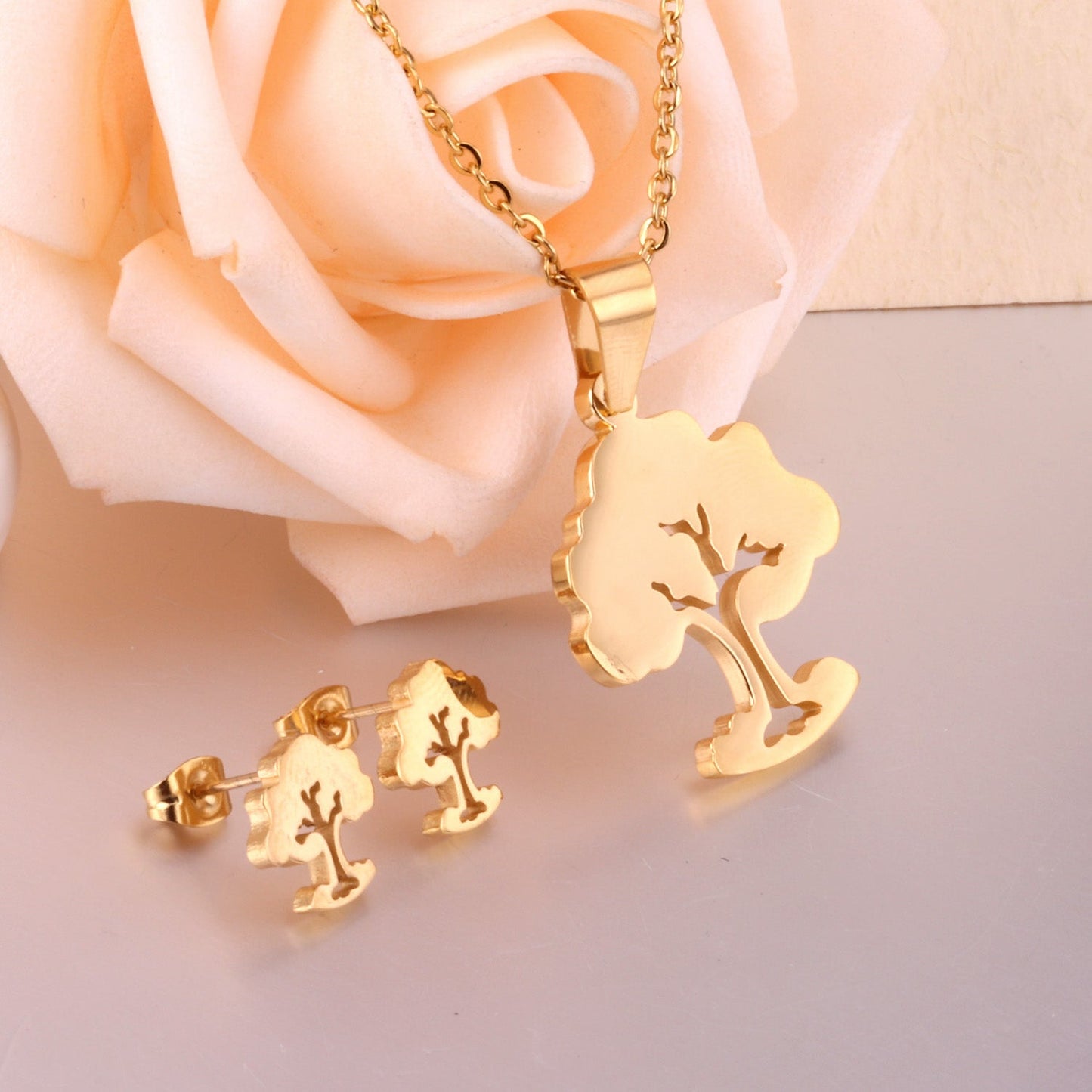 Steel/golden hollow faceted large tree cut jewelry set without diamonds