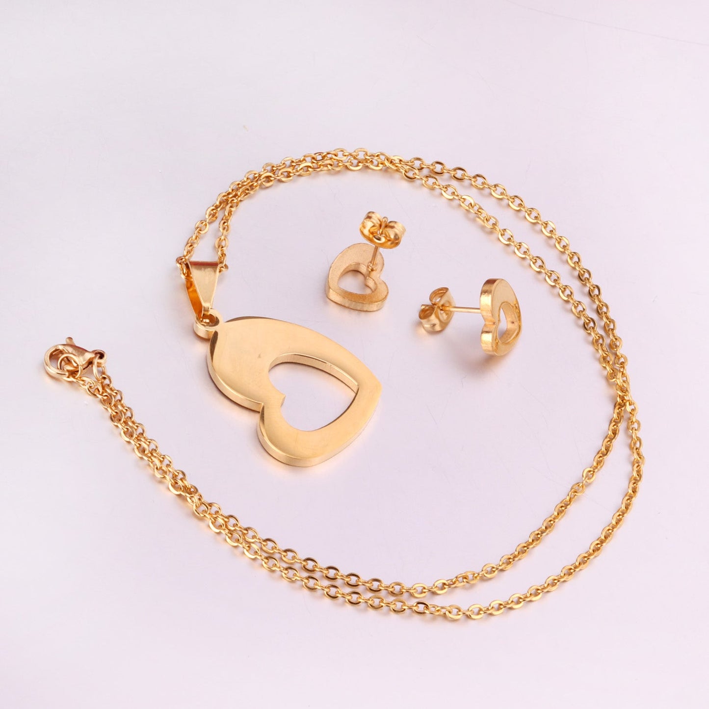 Steel/Gold Wispy Faceted Heart Cut Jewelry Set without Diamonds