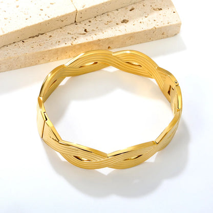 Twisted‑Ribbed Intertwined Hinged Bangle | 18K Gold Plated Stainless Steel | Chunky Statement Bracelet Wholesale