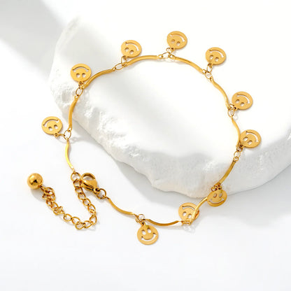Adjustable Dainty Hollow Smiley Face Dangle Wavy Chain Anklet | 18K Gold Plated Stainless Steel | Wholesale MOQ 12