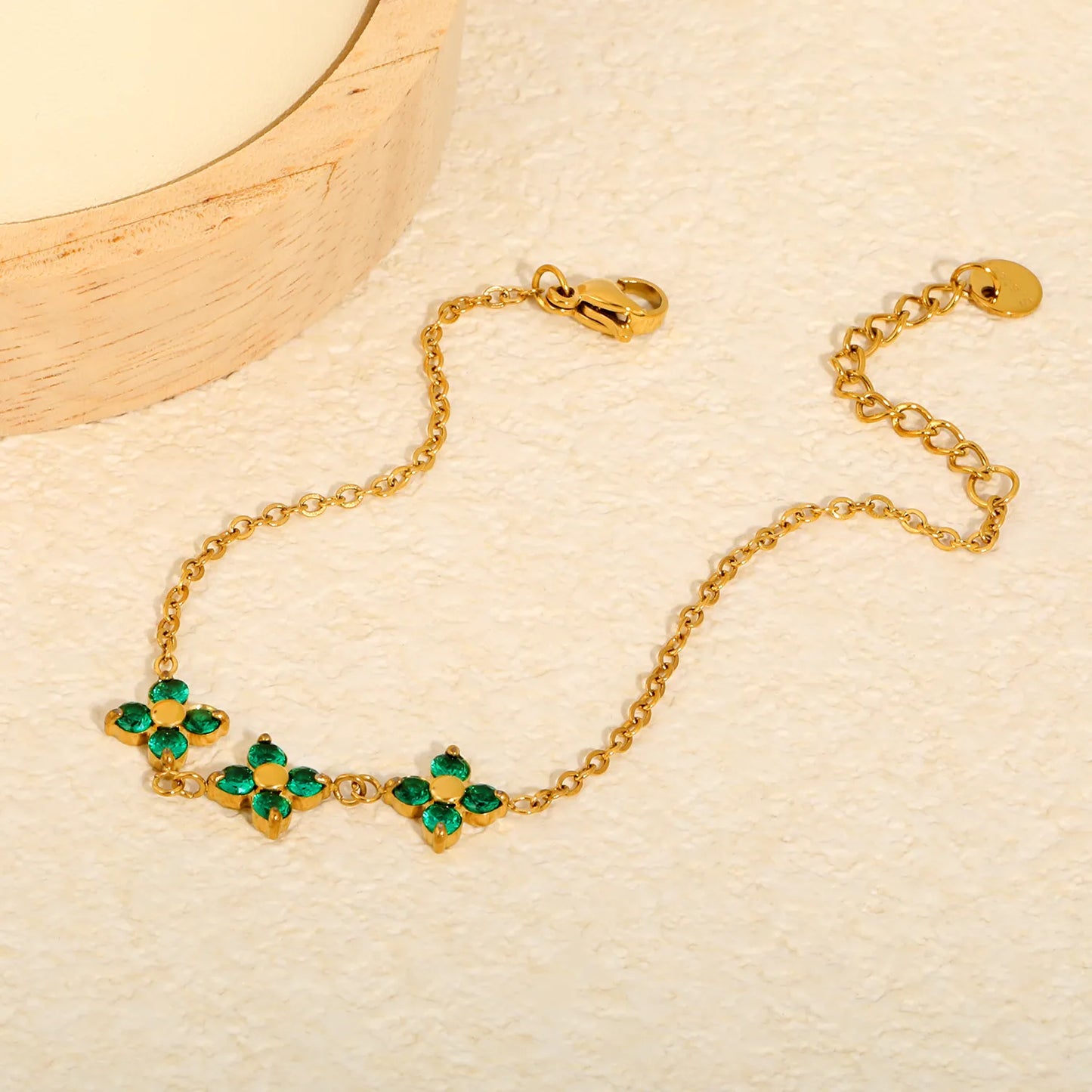 Triple Emerald Zircon Four Leaf Clover Adjustable Extension Bracelet | 18K Gold Plated Hypoallergenic Stainless Steel | MOQ 12