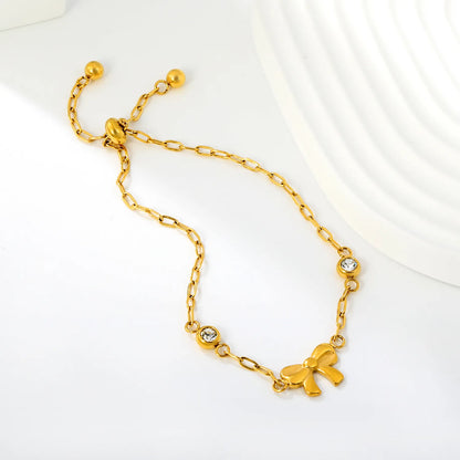 Solid Bow Pendant Two Side Round Zircon Paperclip Chain Slider Adjustable Bracelet | 18K Gold Plated Hypoallergenic Stainless Steel Feminine Wrist Chain Bulk Wholesale