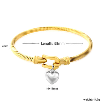 Two-Tone Twisted Cable Wire Bangle with Puffy Heart Charm | 18K Gold Plated Stainless Steel Horseshoe Buckle Cuff Bracelet | Wholesale MOQ 12