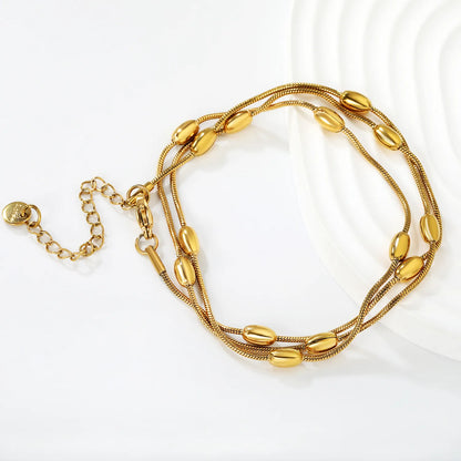 Wholesale Layered Chain Bracelet with Oval Bead Charm | 18K Gold Plated & Silver | Adjustable Length | MOQ 12