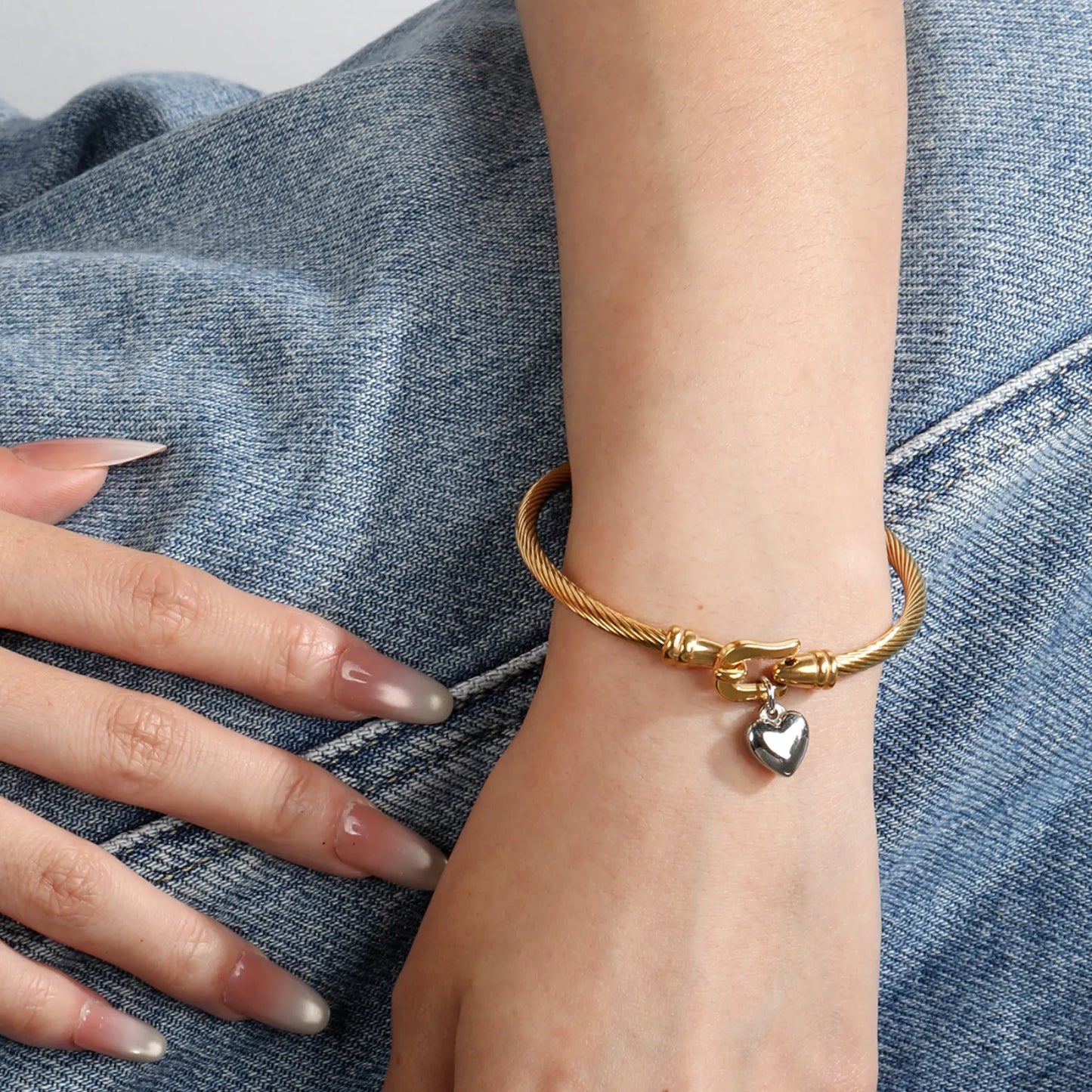 Two-Tone Twisted Cable Wire Bangle with Puffy Heart Charm | 18K Gold Plated Stainless Steel Horseshoe Buckle Cuff Bracelet | Wholesale MOQ 12