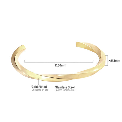 Three colors of black gold-tone steel with a rotating surface on an open-end rigid bracelet.