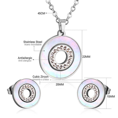 Gold/steel color white shells set with diamonds on top of circle with diamonds jewelry set