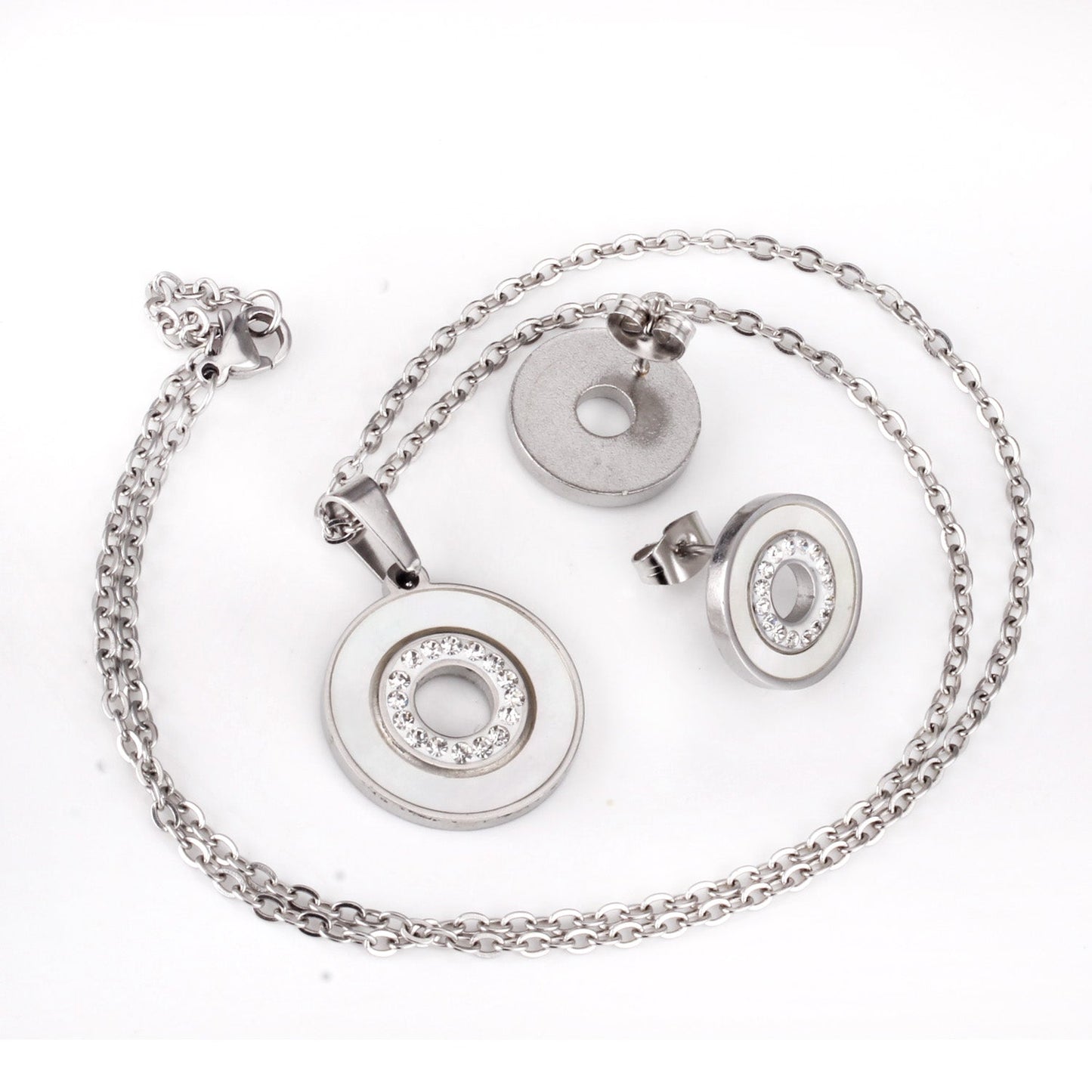Gold/steel color white shells set with diamonds on top of circle with diamonds jewelry set
