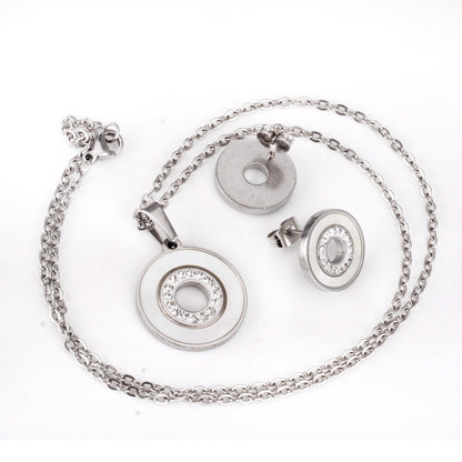 Gold/steel color white shells set with diamonds on top of circle with diamonds jewelry set