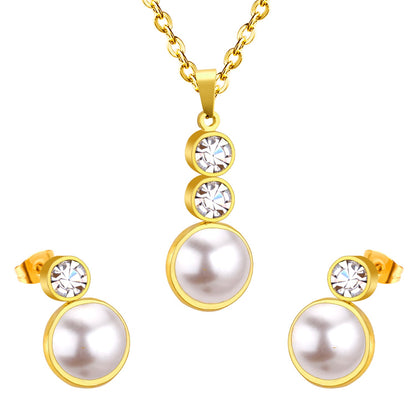 Gold/steel-colored sticky pearls set + two small round cakes topped with diamonds