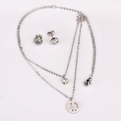 Steel/golden double chain pendant jewelry set with diamonds in the form of a round bridge stand + diamonds on one chain