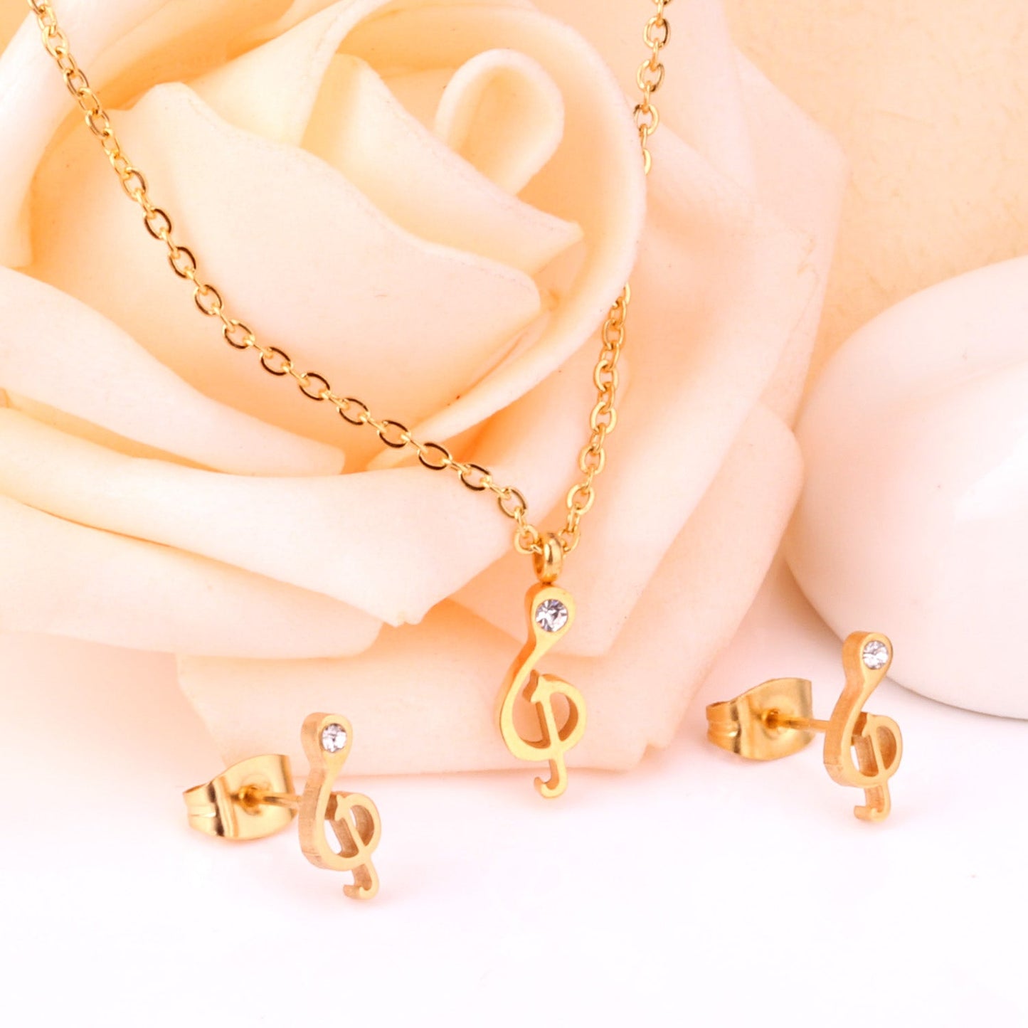 Gold/Steel Music Note Cut Jewelry Set with Diamonds