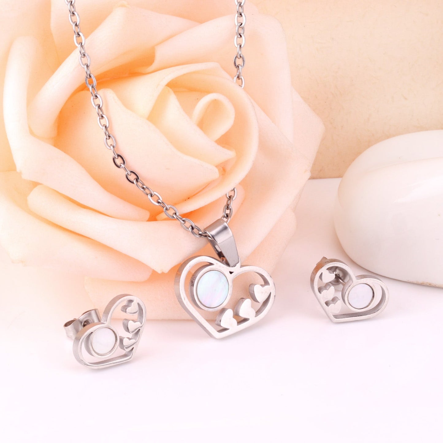 Gold/Steel Wispy Cut Heart Shape White Shell Jewelry Set