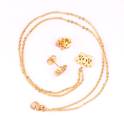 Gold/steel cut crown shape jewelry set with diamonds