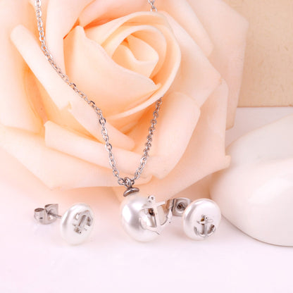 Steel/golden white pearl + anchor cut jewelry set