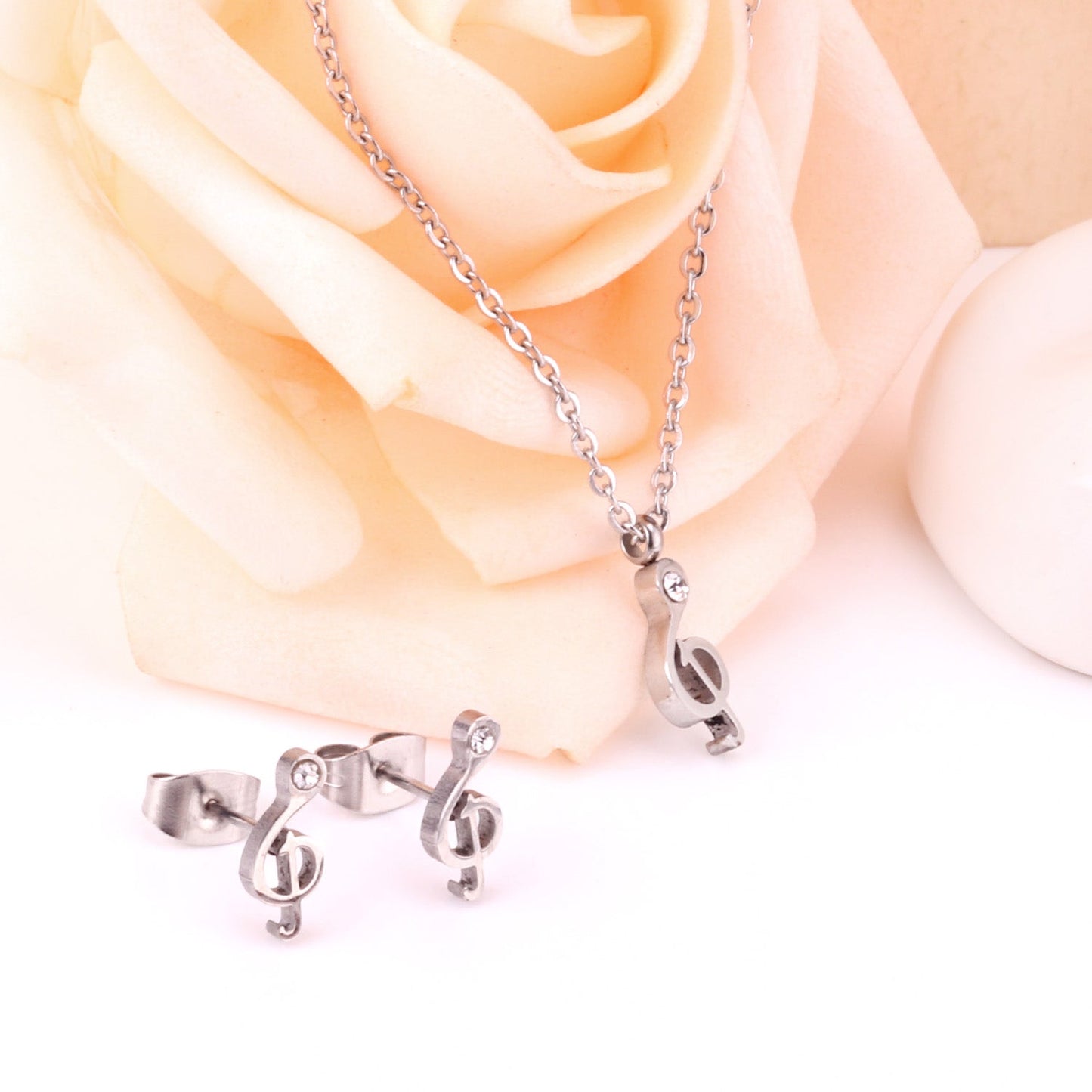 Gold/Steel Music Note Cut Jewelry Set with Diamonds