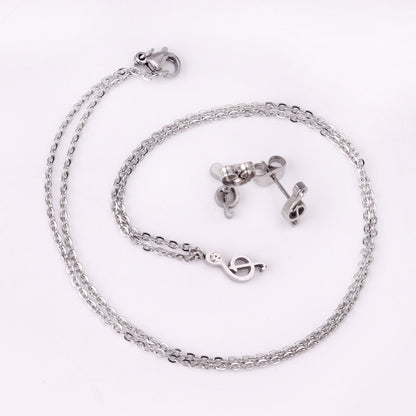 Gold/Steel Music Note Cut Jewelry Set with Diamonds