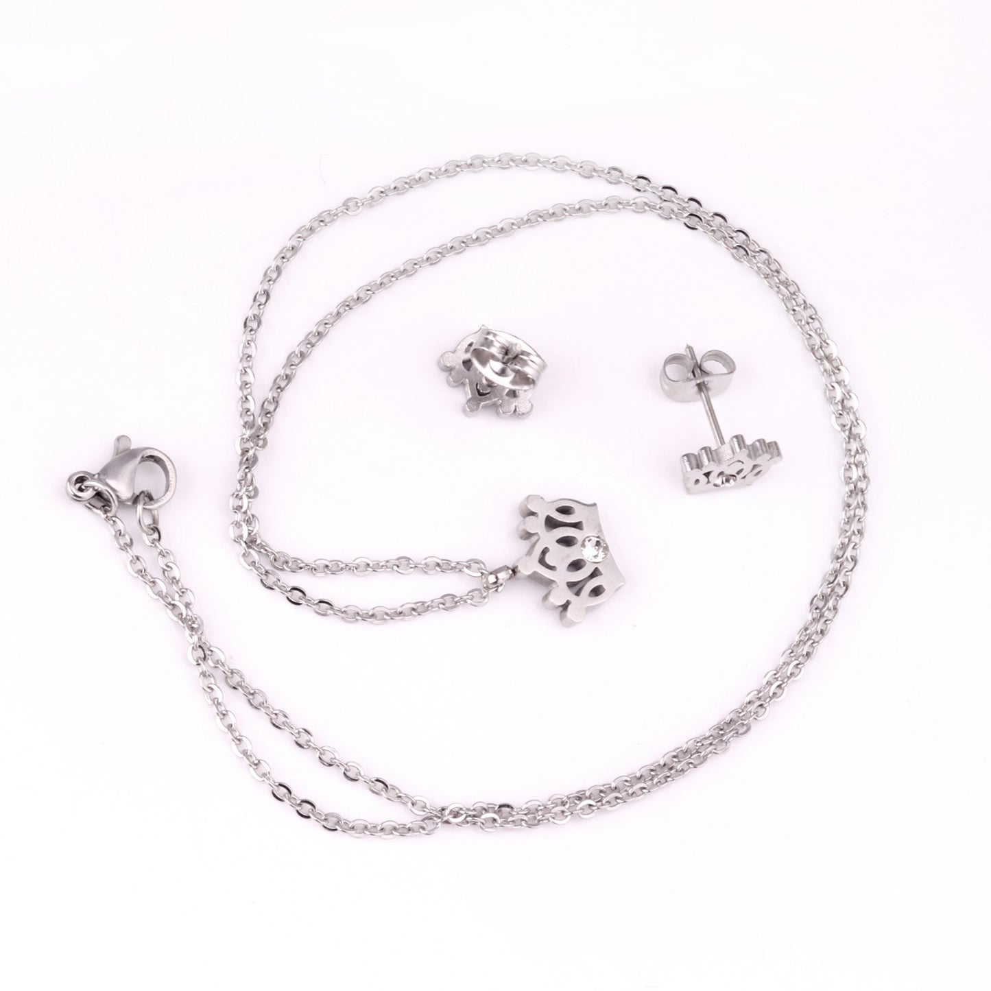 Gold/steel cut crown shape jewelry set with diamonds