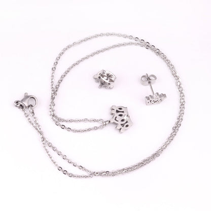 Gold/steel cut crown shape jewelry set with diamonds