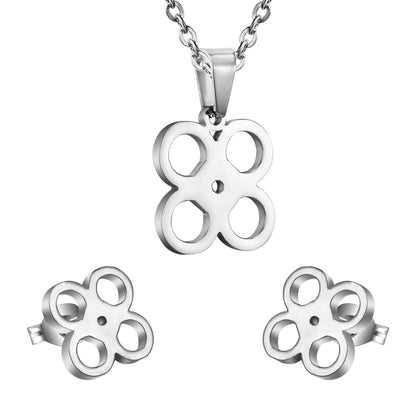 Gold/steel cut jewelry set with four regular round faceted center wisps without diamonds