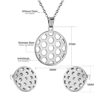 Gold/steel football-like discs with a hollowed-out center, faceted cut jewelry set with no diamonds.
