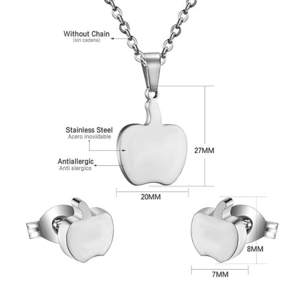 Gold/steel colored cut jewelry set with a golden apple on the cutting process