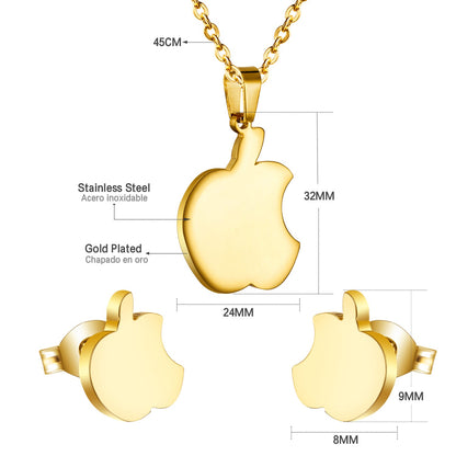 Set of jewels in gold/steel with a smooth surface of an apple with a bite.