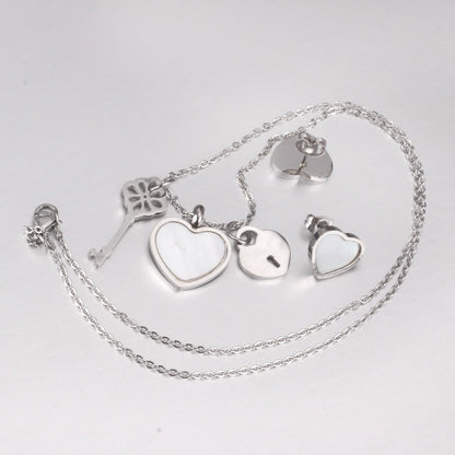 Steel/Gold Cut Three Shapes Pendant with White/Black Shell Jewelry Set