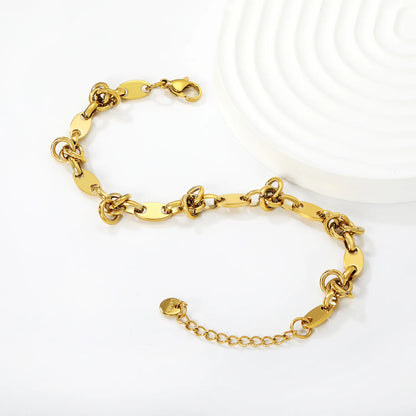 Wholesale Oval Plate & Knot Link Chain Bracelet in Gold Stainless Steel | Adjustable Minimal Statement Bracelet