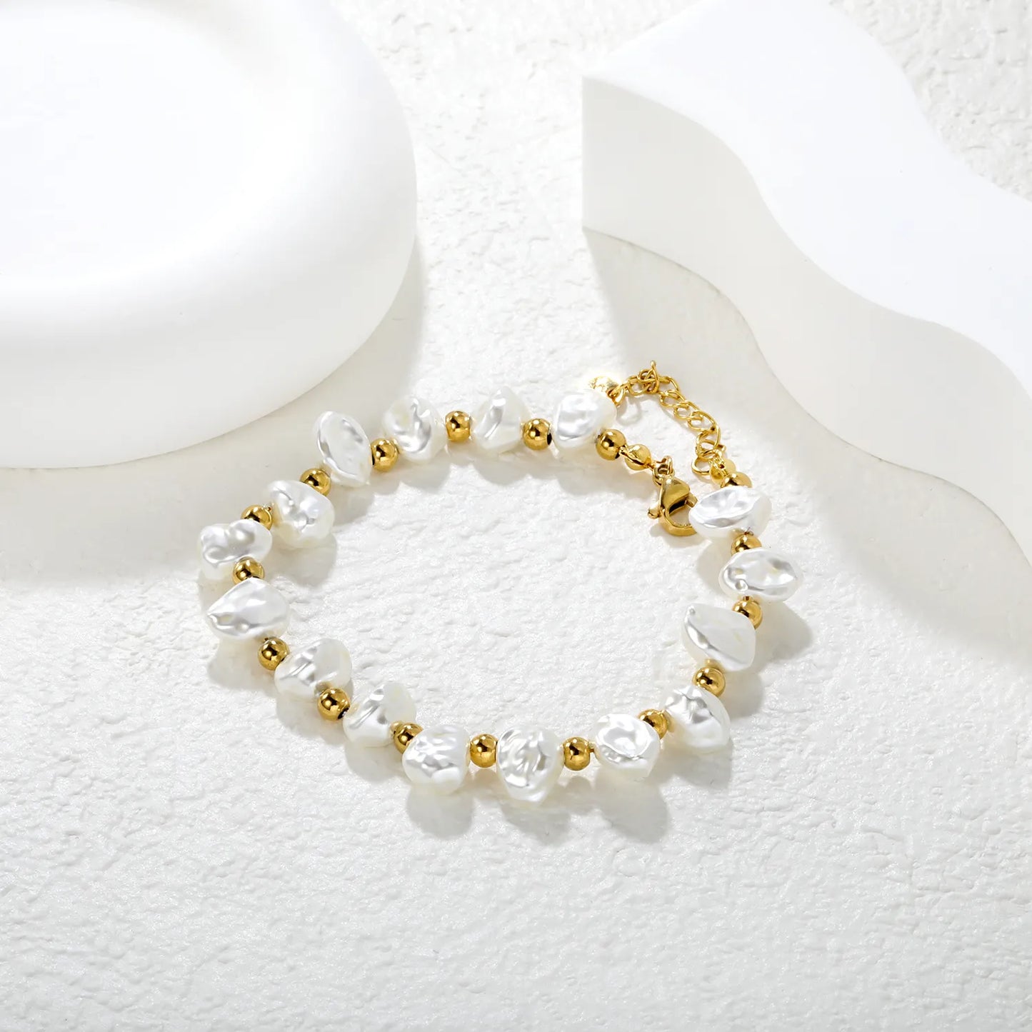 Gold-Tone Stainless Steel Shell Charm Bracelet for Wholesale | 8x9mm Irregular Beads, 4mm Spacers